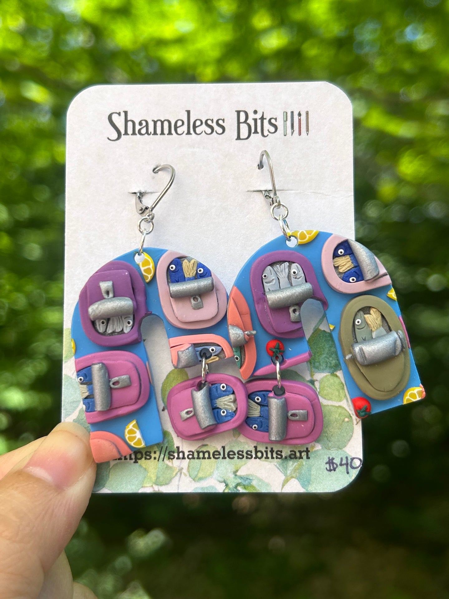 Sardine dangles with charm